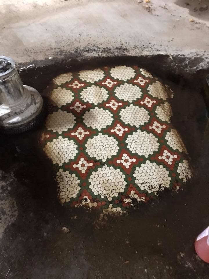 Historic bank marble floor restoration in downtown Kansas City - restored terrazzo and marble surfaces showing mirror-like finish