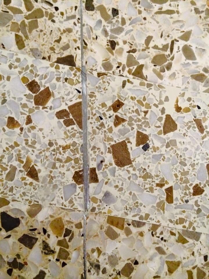 Travertine polishing showing restored and sealed surface in luxury home