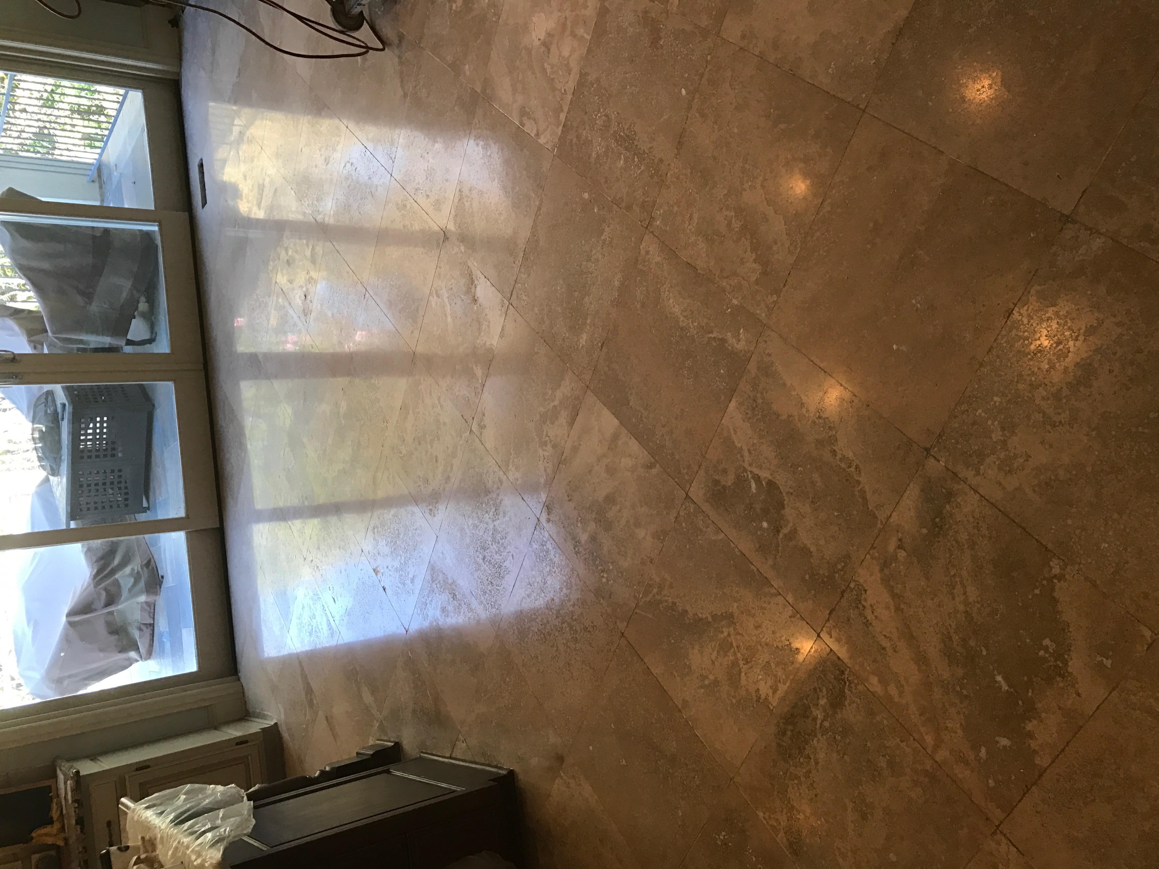 Travertine floor restoration and polishing